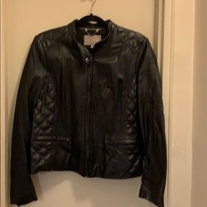Black leather moto jacket with quilting details
